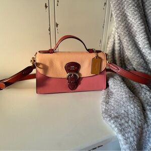 Authentic Coach Kleo top handle bag with crossbody strap.